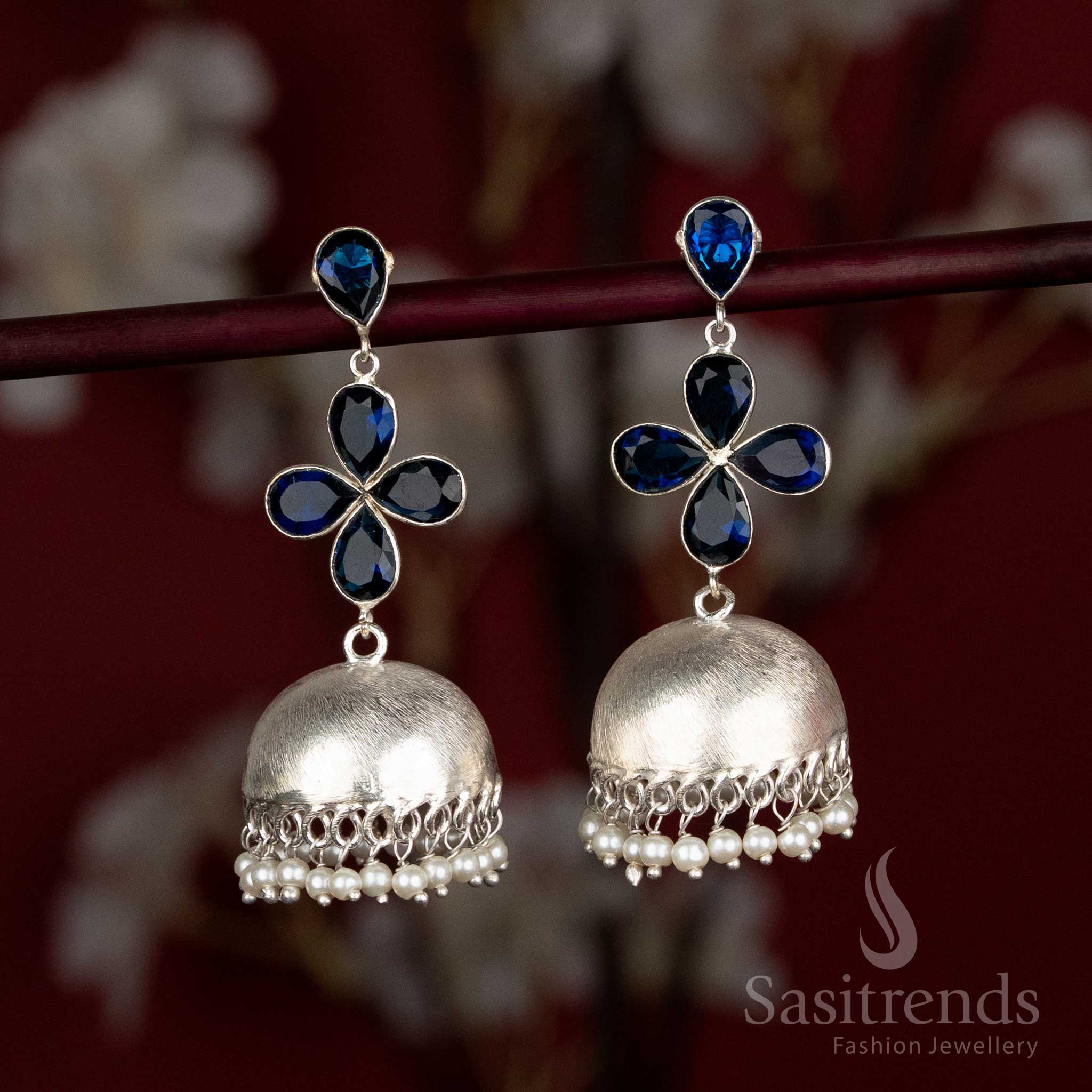 Blue oxidised four-petal jhumka earrings with pearl accents – ideal for festive moments and regular office looks – Sasitrends
