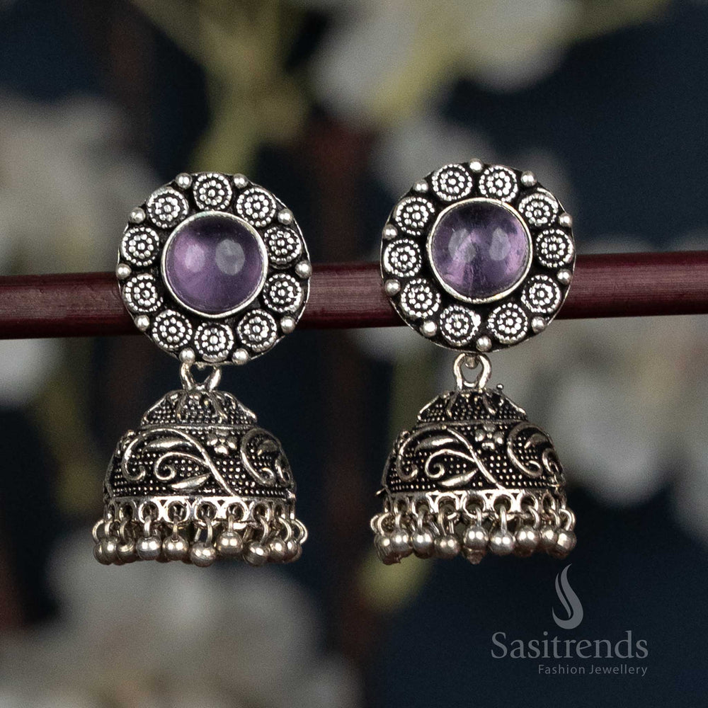 Oxidised jhumka earrings with floral design and stone stud - Sasitrends