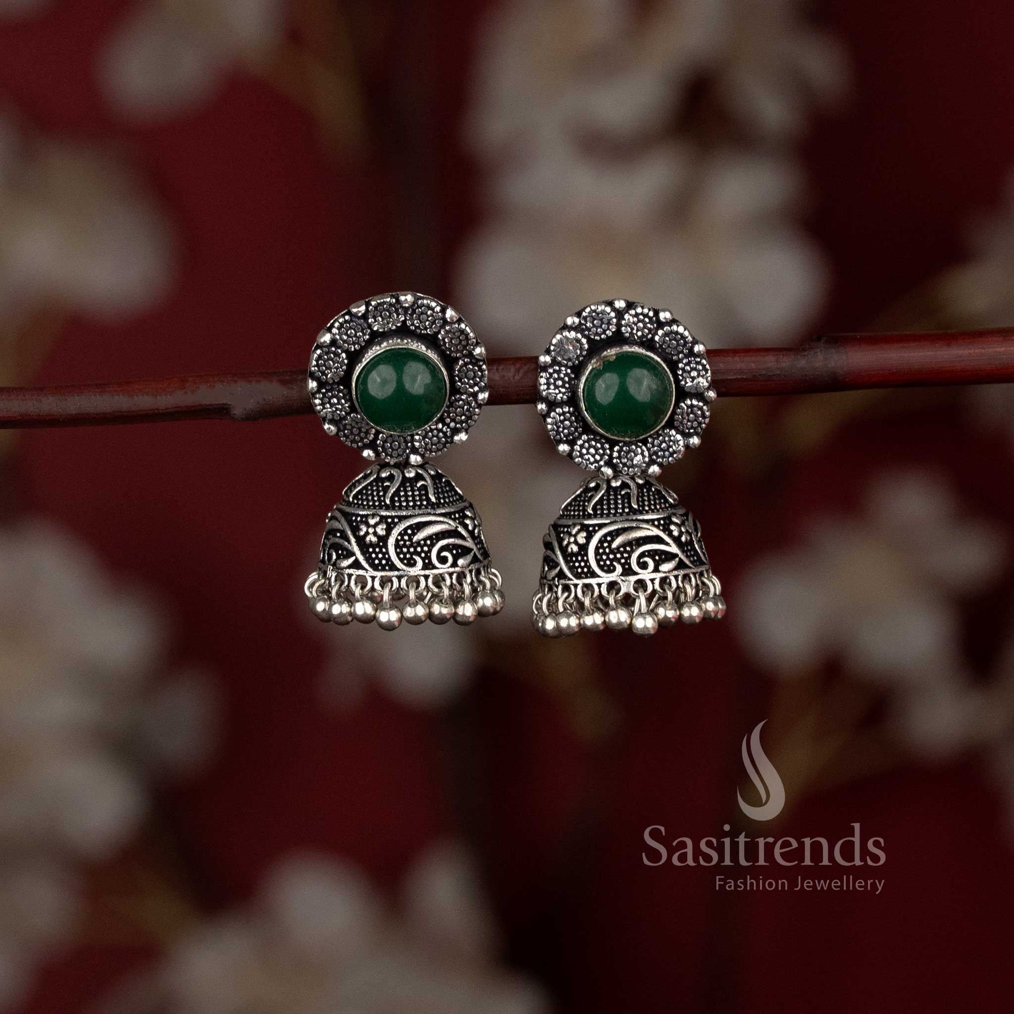 Oxidised jhumka earrings with floral design and stone stud - Sasitrends