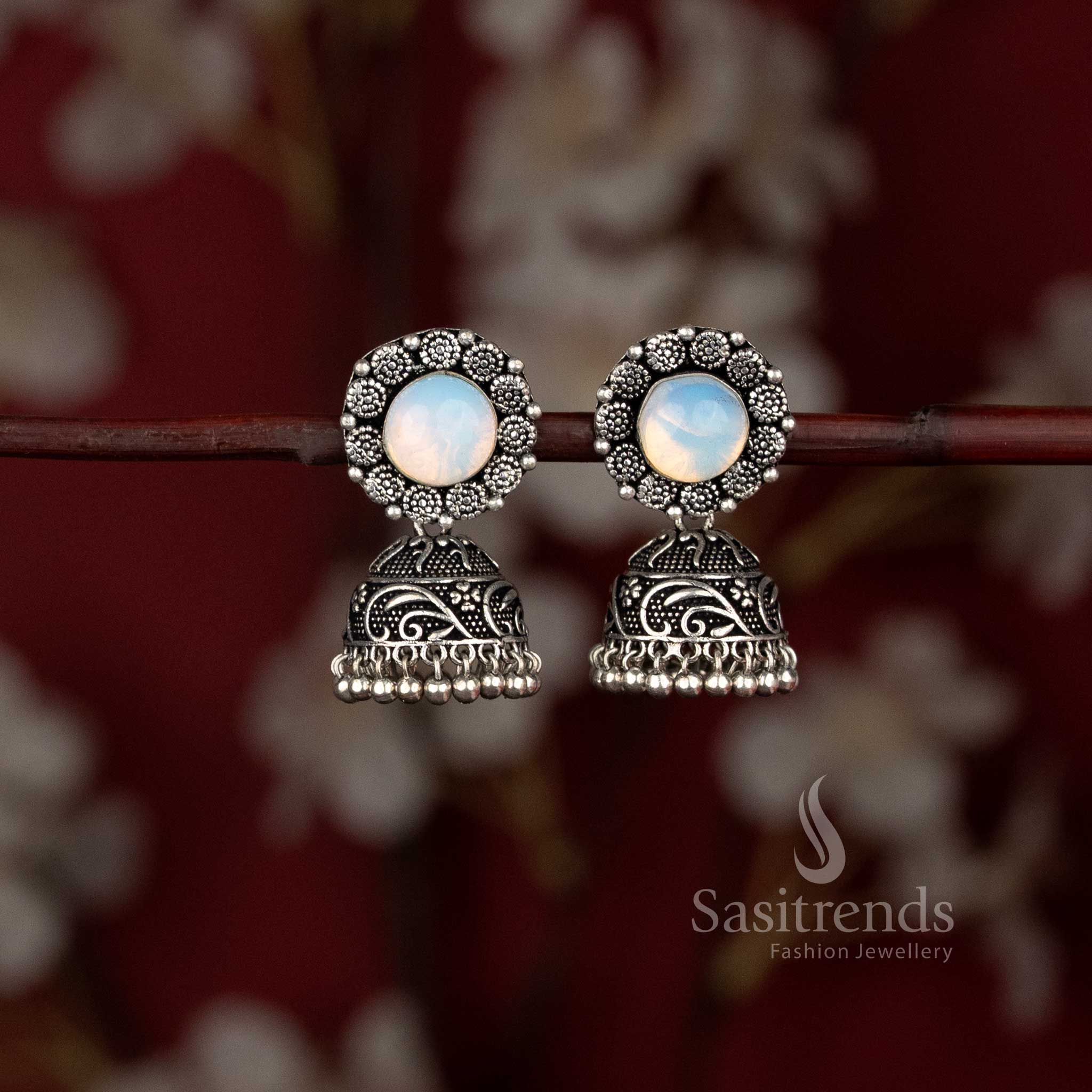Oxidised jhumka earrings with floral design and stone stud - Sasitrends