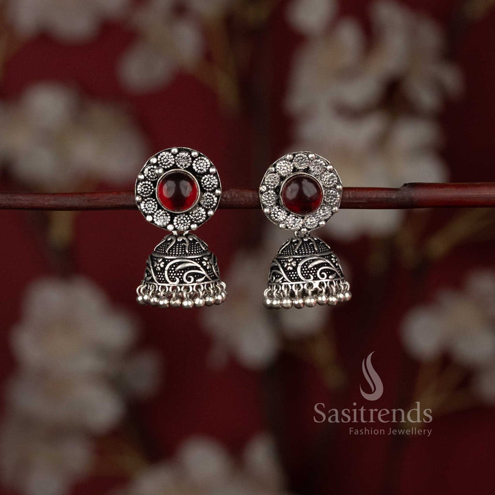 Oxidised jhumka earrings with floral design and stone stud - Sasitrends