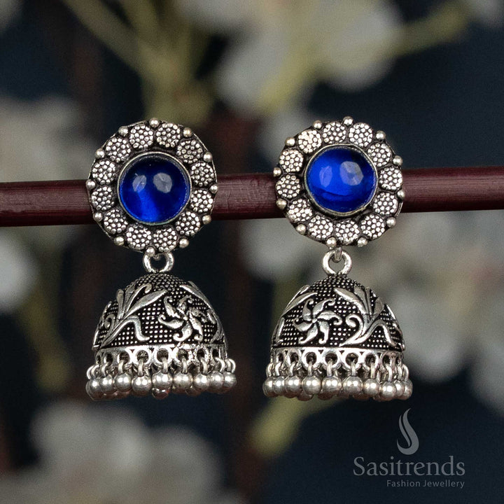 Blue Oxidised jhumka earrings with floral design and stone stud - Sasitrends