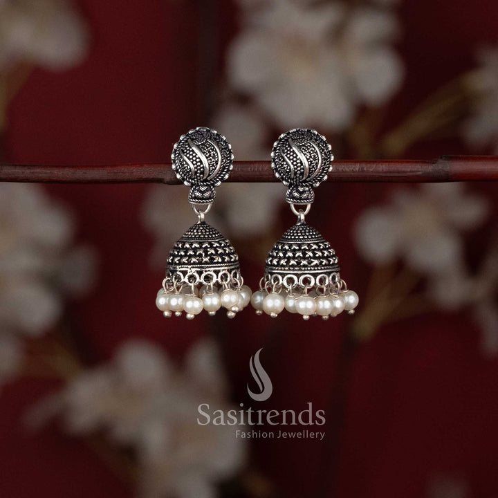 Traditional tribal style oxidised lotus stud jhumka earrings with ghungroo drops - Sasitrends
