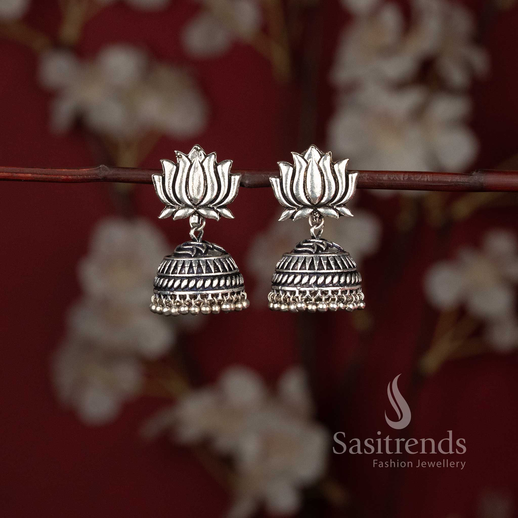 Traditional tribal style oxidised lotus stud jhumka earrings with ghungroo drops - Sasitrends