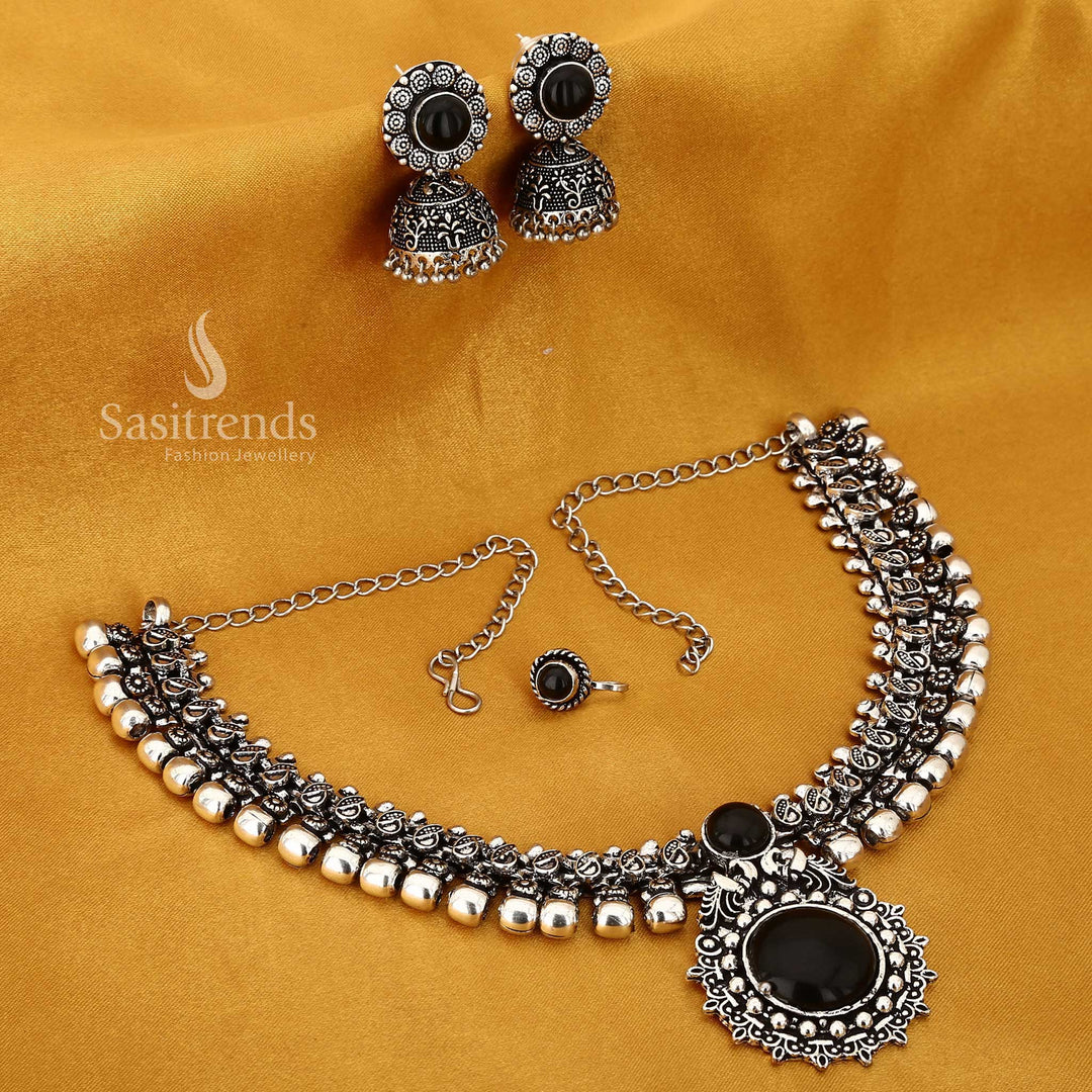 Mystic Noir Haarini black oxidised silver jewellery set featuring a dual-layer chain necklace and bold mango design bangles, styled for dark elegance and contemporary tradition – Sasitrends