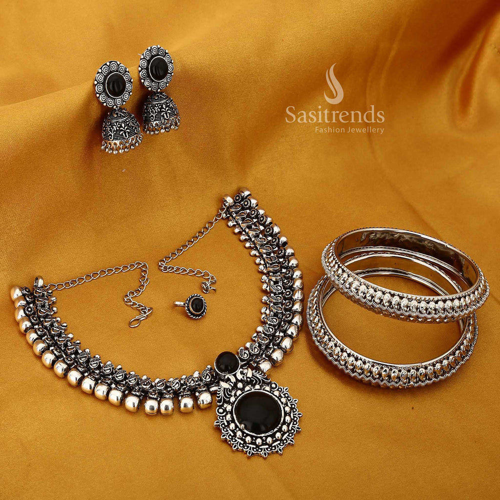 Oxidised black jewellery combo set with temple charm accents on the necklace and tribal-inspired mango bangle designs, perfect for soulful ethnic ensembles – Sasitrends