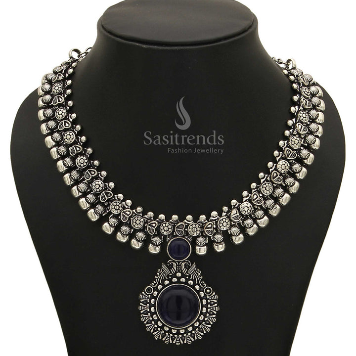 Bright Haarini oxidised silver necklace with a captivating azure sky blue gemstone pendant, radiating a cheerful and airy elegance from Sasitrends