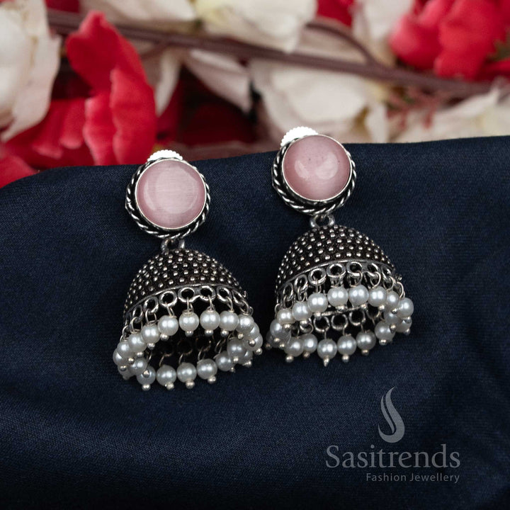Chic oxidised pink Jhumka earrings with intricate pearl bead detail and polished round stud tops – elegant traditional jewellery for girls and women – Sasitrends