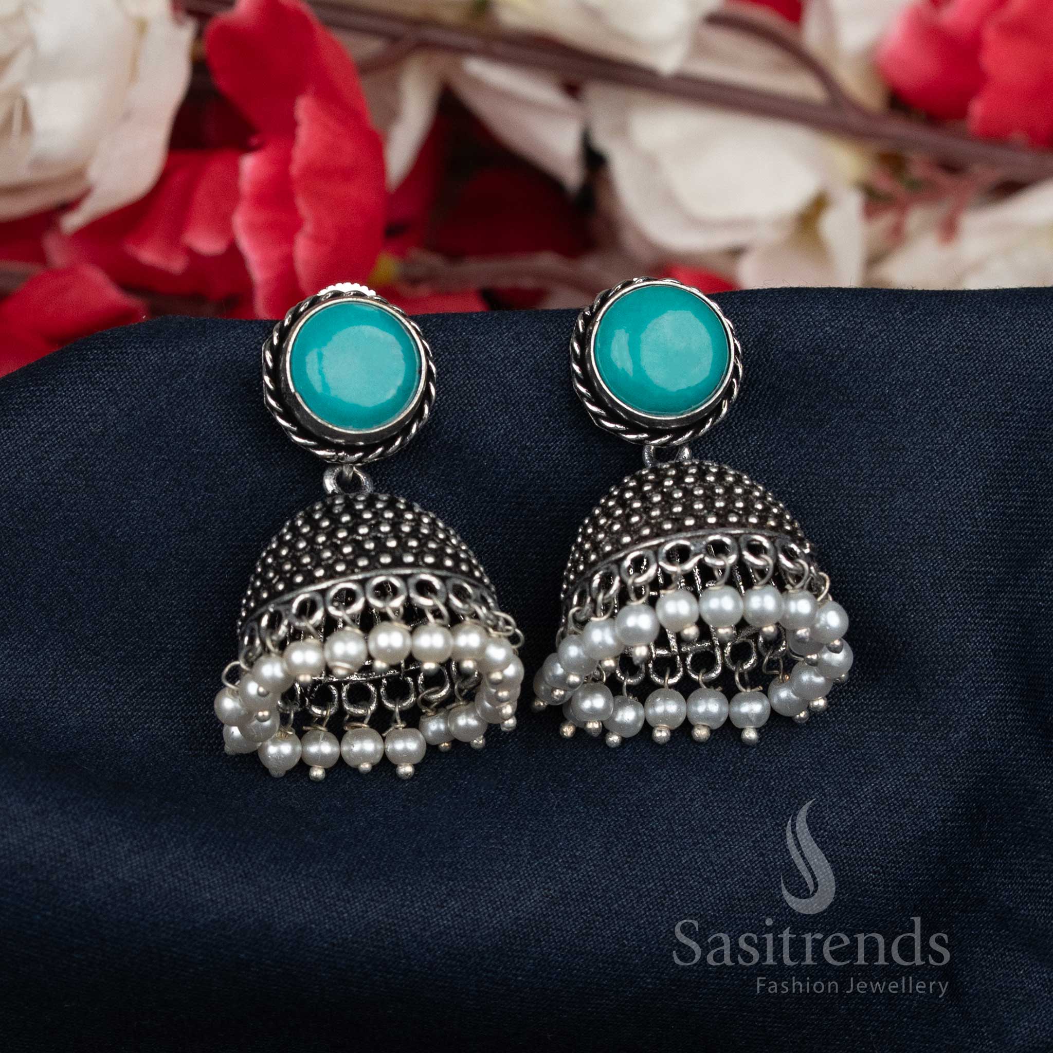 Cool-toned oxidised mint Jhumka earrings adorned with pearl beads and vintage-style round studs – an artisanal jewellery piece for ethnic ensembles – Sasitrends