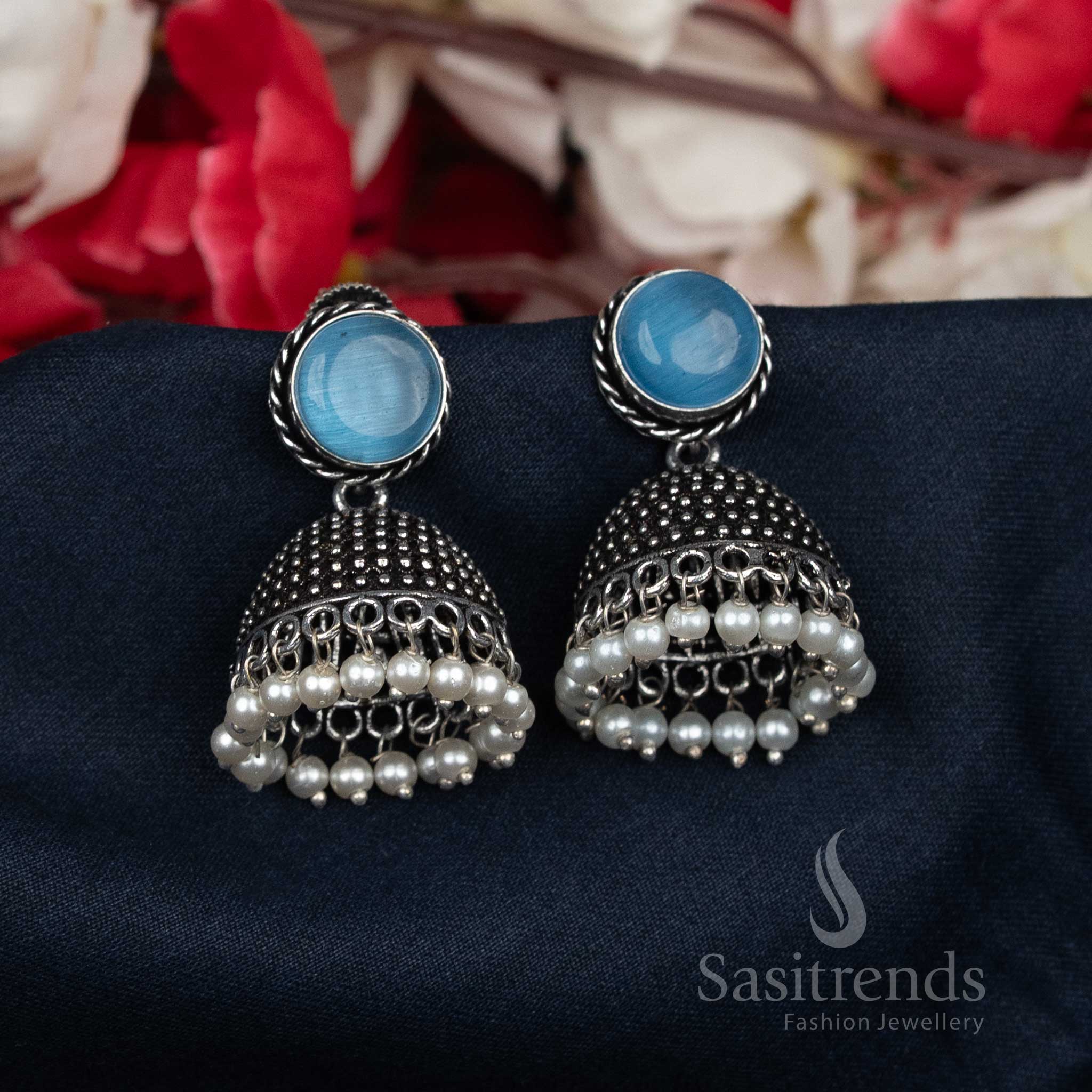 Royal oxidised blue Jhumka earrings with pearl-beaded clusters and bold round studs – statement jewellery designed for traditional ethnic looks – Sasitrends

