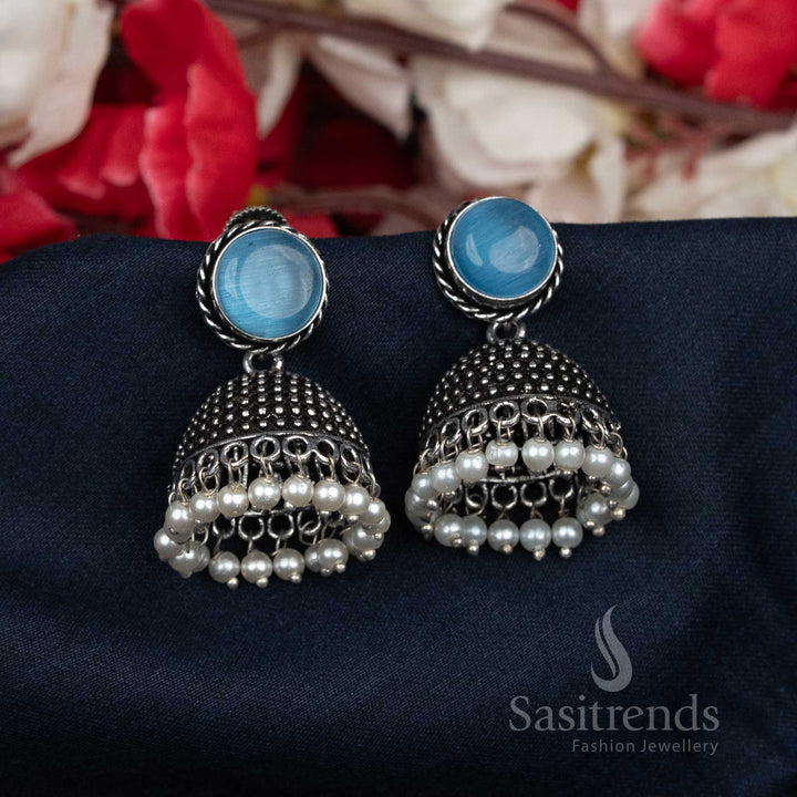 Royal oxidised blue Jhumka earrings with pearl-beaded clusters and bold round studs – statement jewellery designed for traditional ethnic looks – Sasitrends

