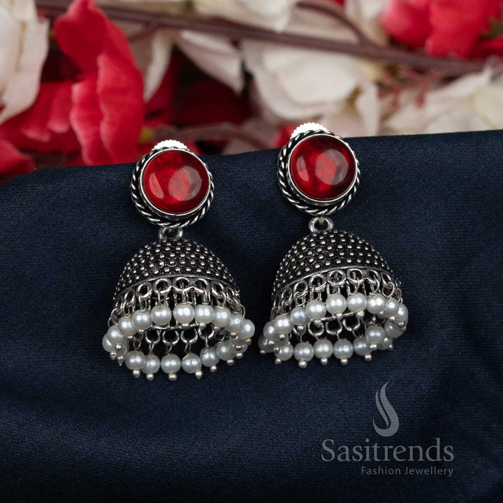 Vibrant oxidised red pearl-beaded Jhumka earrings featuring rounded stud tops – festive fashion jewellery for showcasing classic traditional charm – Sasitrends