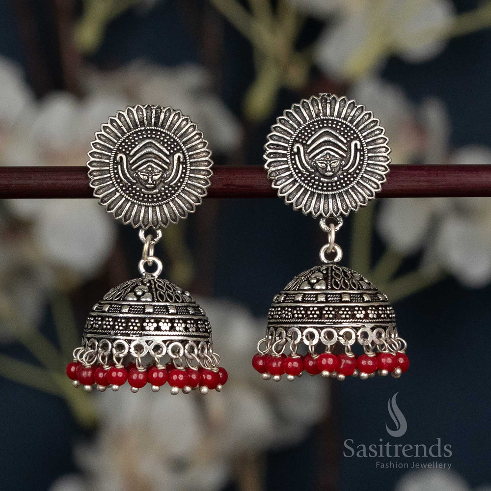 Tribal engraved oxidised jhumka earrings with sunburst top 