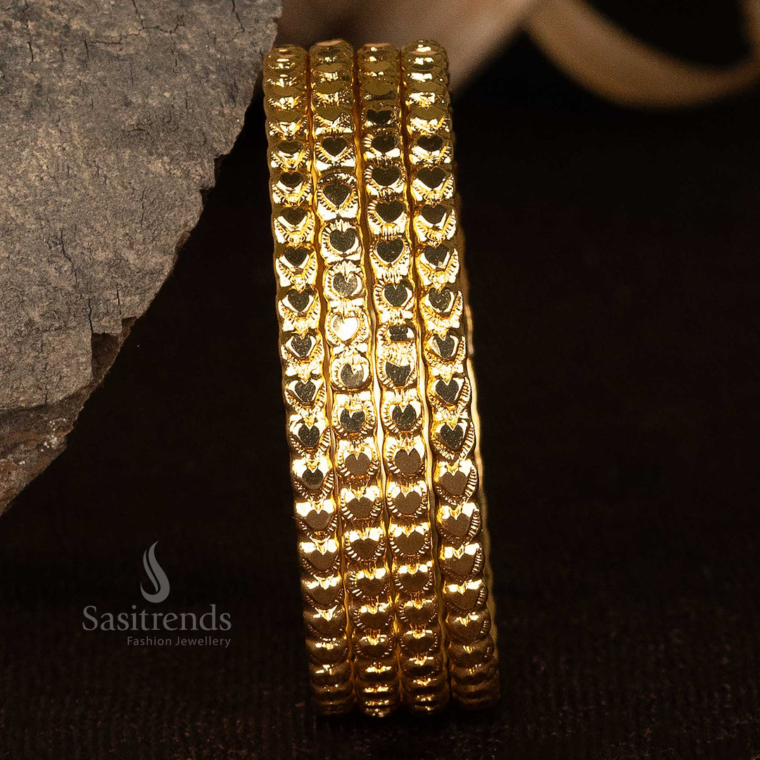 Micro gold bangles with heart-shaped patterns and 24-carat look, perfect for festivals - Sasitrends
