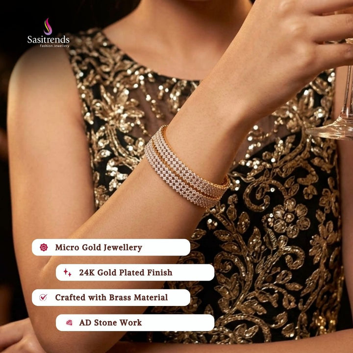 Beautiful collection of micro gold plated bangles styled by a model, elegant traditional jewellery suitable for festive wear, wedding functions, party occasions, and ethnic outfits from Sasitrends.