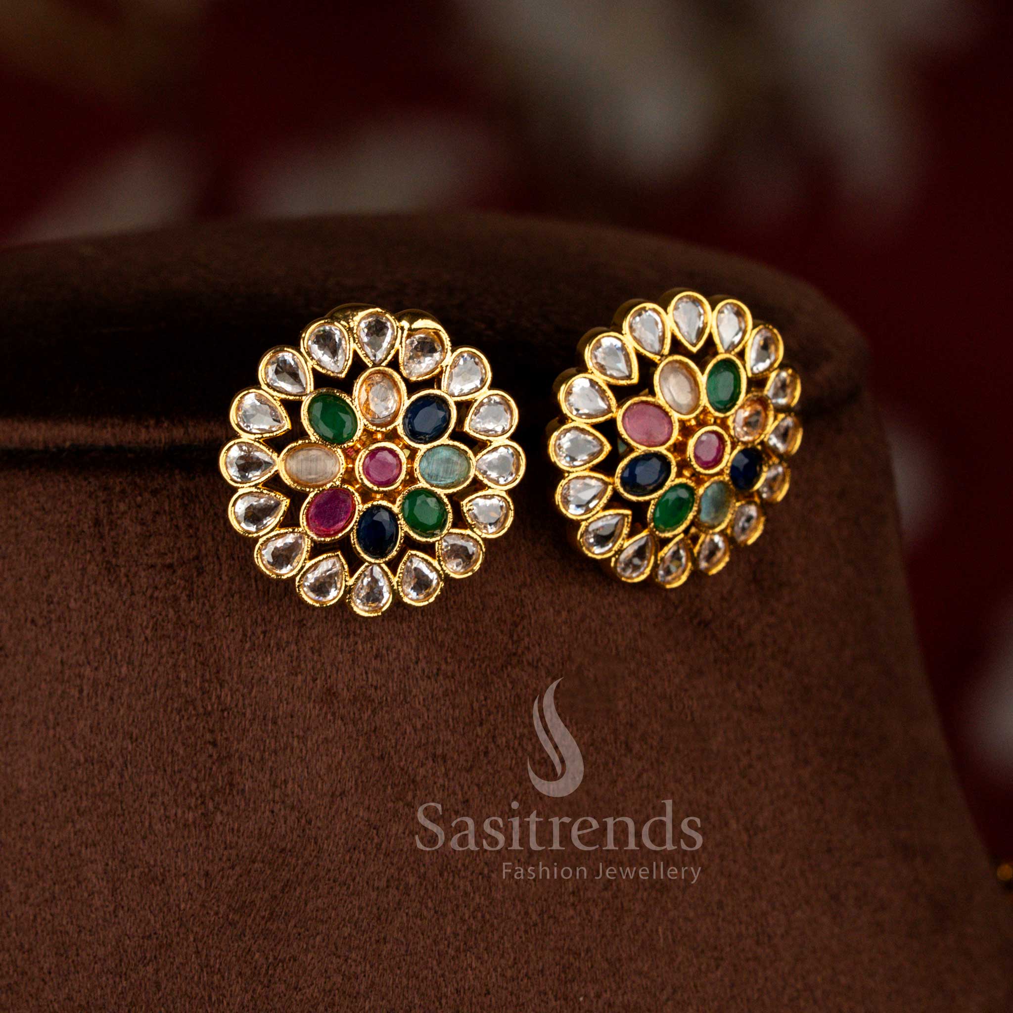Matte gold plated floral stud earrings crafted with multi colour baguette American diamonds for cultural program wear – Sasitrends