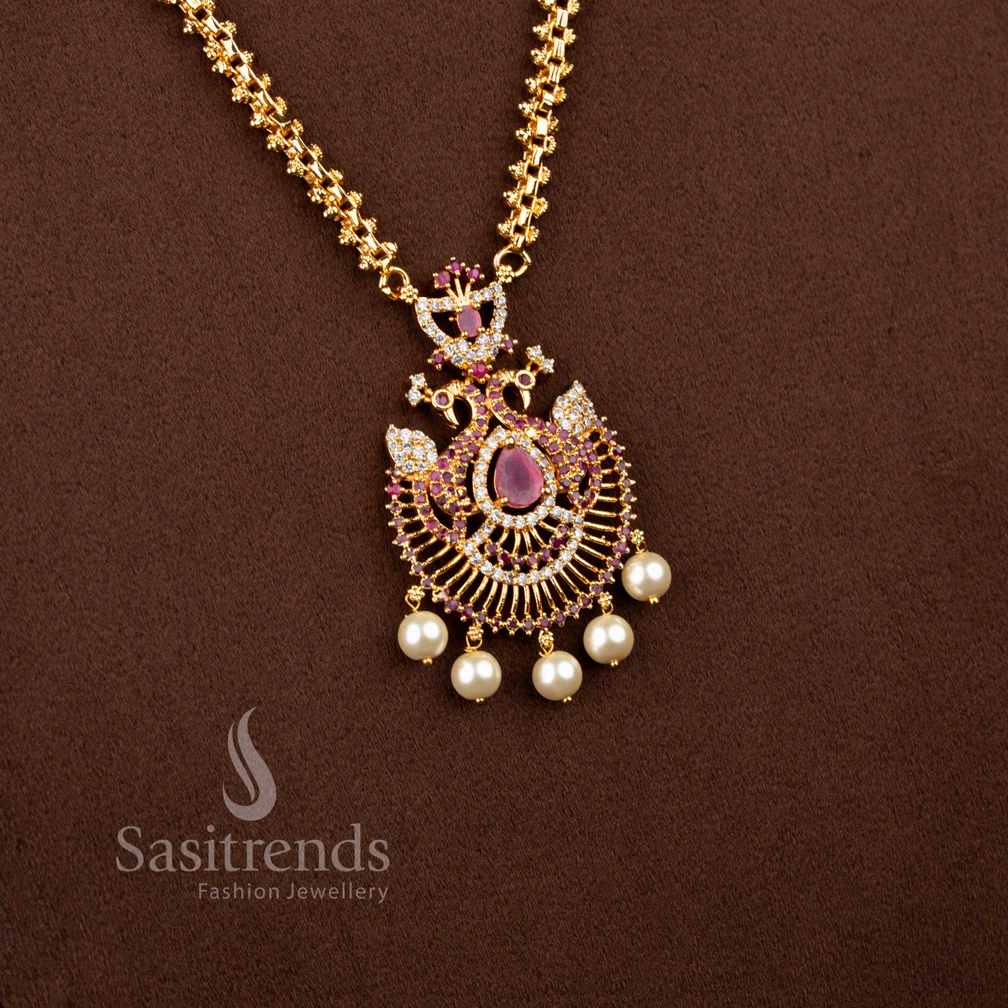 Charming micro gold plated 2-side Gajiri chain necklace in white-ruby with pear stone peacock pendant and pearl drops – Sasitrends