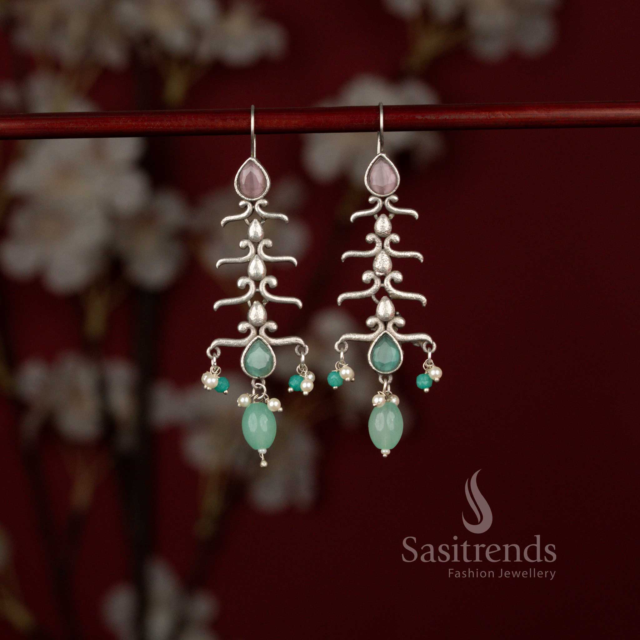 Divine oxidised statement earrings with layered drops, pink mint hues and pearl hangings suited for ethnic outfits – Sasitrends