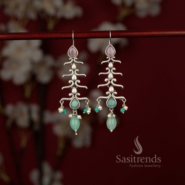 Divine oxidised statement earrings with layered drops, pink mint hues and pearl hangings suited for ethnic outfits – Sasitrends