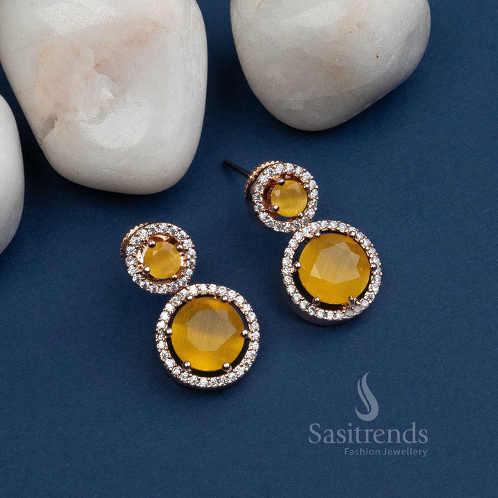 
Mesmerizing Yellow Stone Rose Gold Plated Earrings with American Diamond Stones
