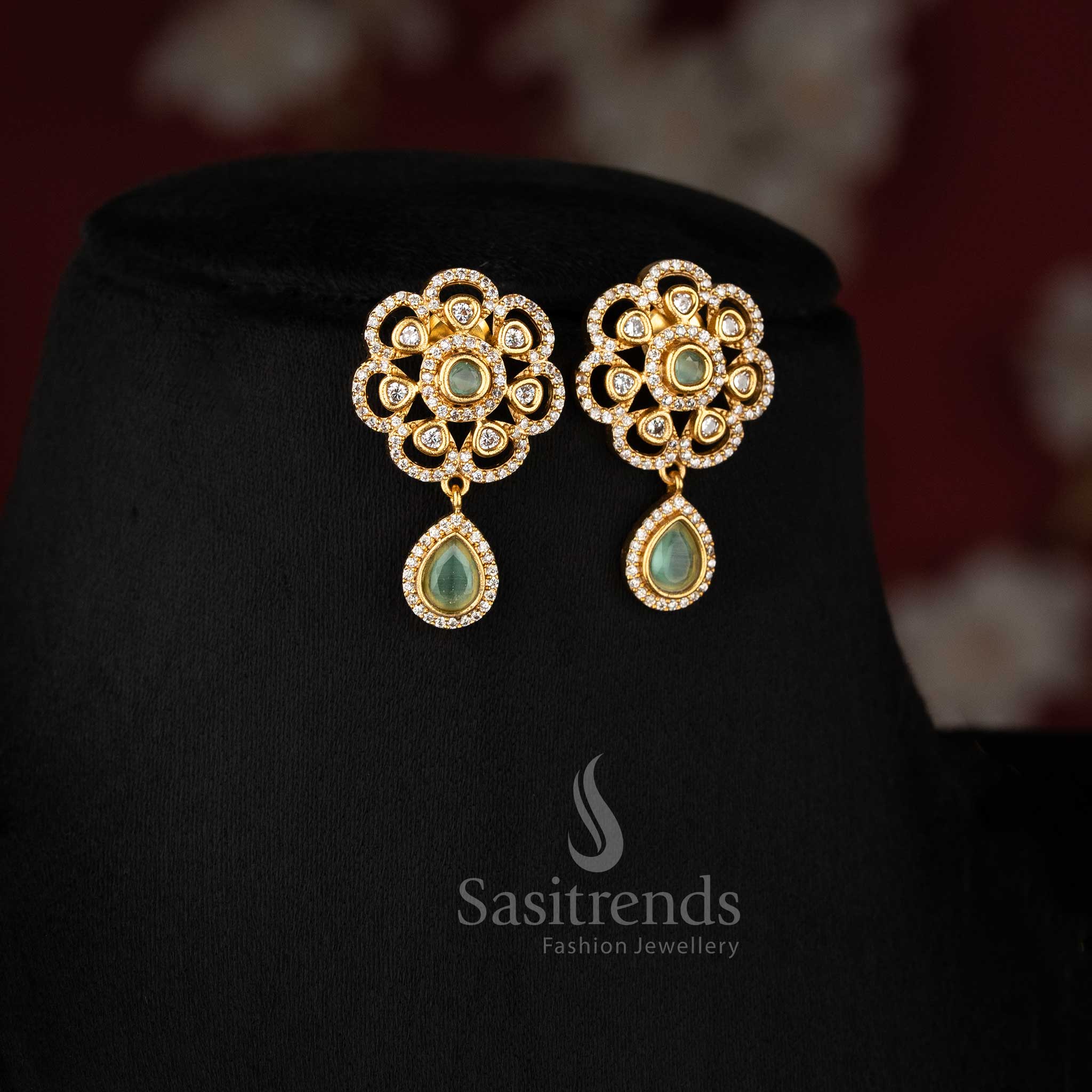 Royal American diamond matte gold dangling floral earrings in mint for women, suitable for festive and traditional celebrations – Sasitrends