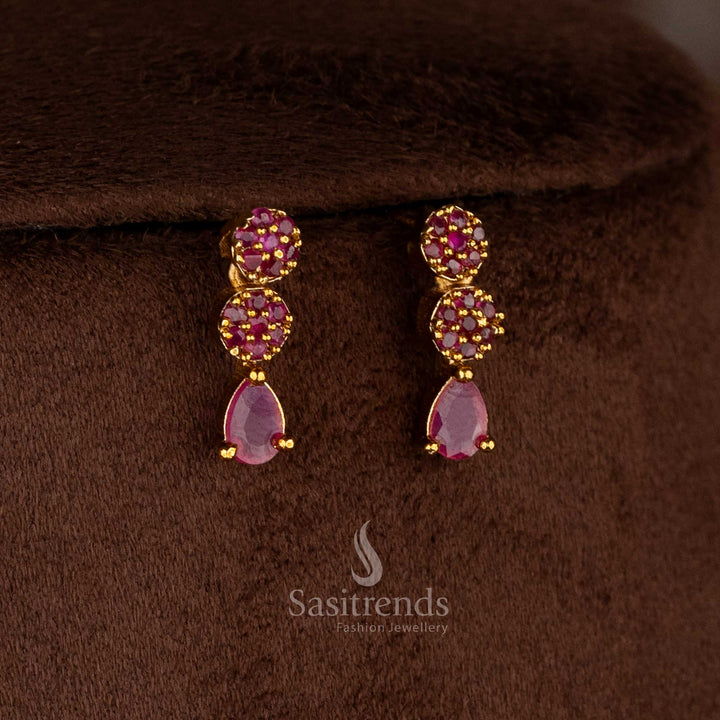Charming American diamond matte gold plated ruby floral teardrop earrings for sarees, kurtis, and celebration-ready styling – Sasitrends