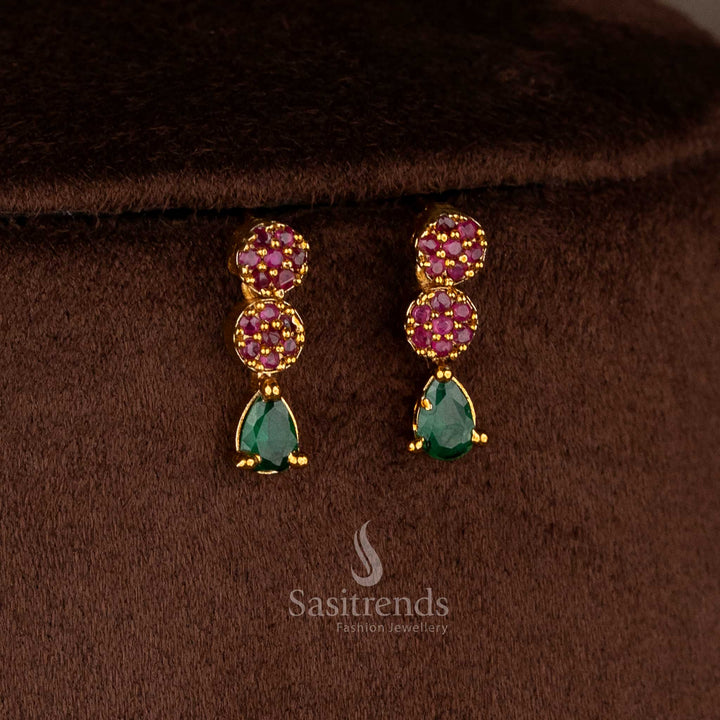 Chic American diamond matte gold plated ruby-green floral teardrop earrings for festive sarees and elegant party wear – Sasitrends