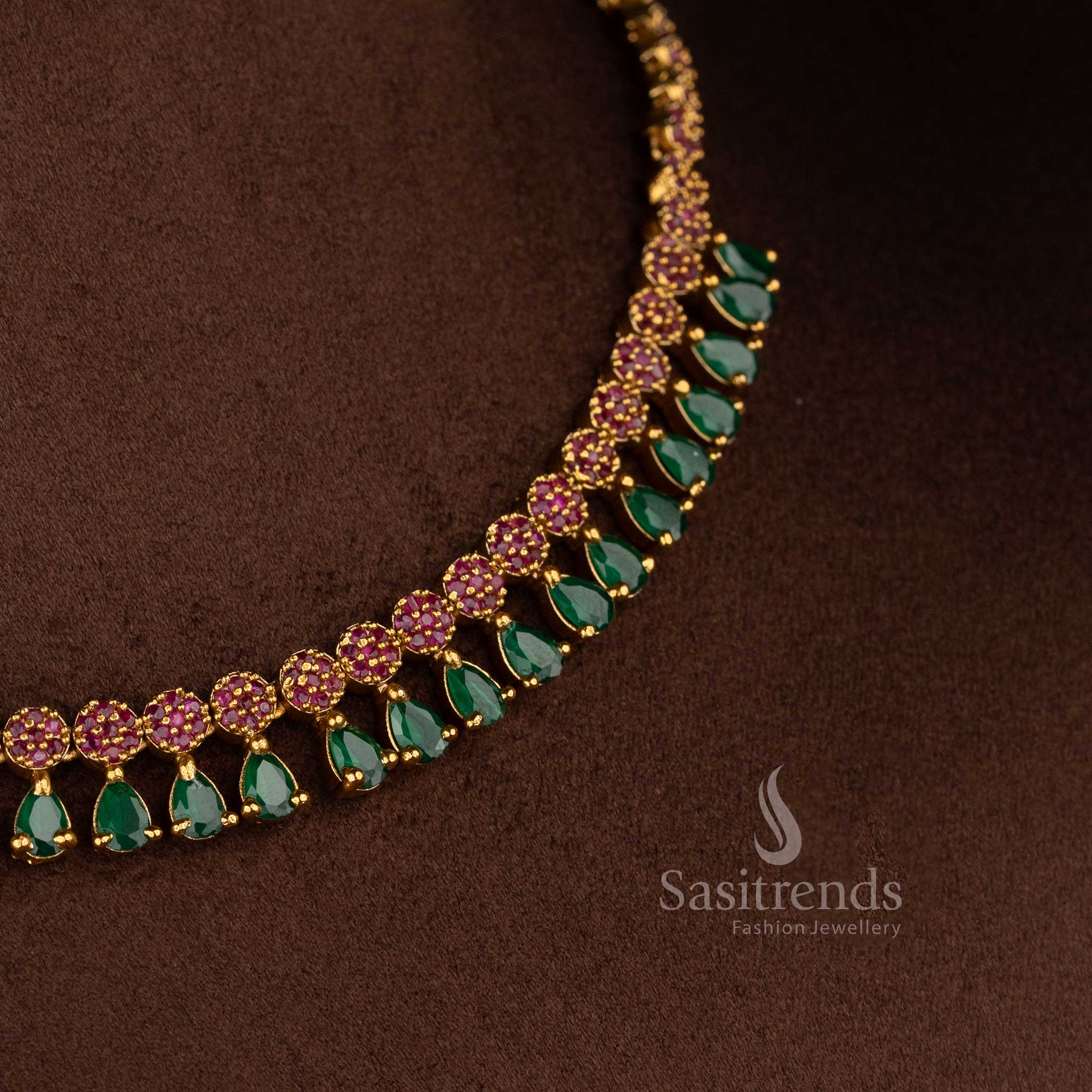 Radiant American diamond matte gold plated ruby-green teardrop floral necklace for festive sarees, party kurtis, and elegant styling – Sasitrends