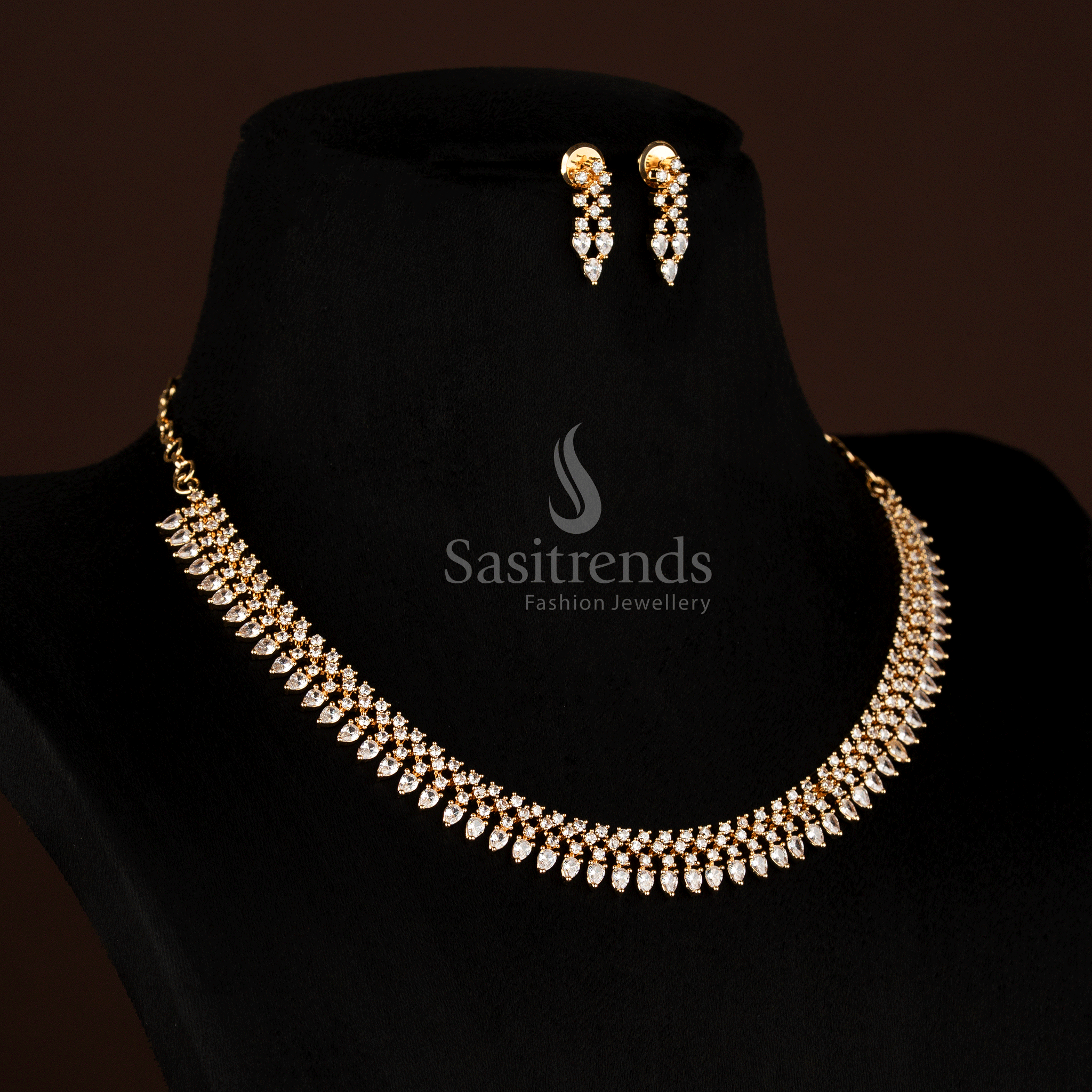 Glorious American Diamond micro gold plated marquise teardrop necklace set crafted with bright white stones, delivering radiant charm for memorable celebratory moments – Sasitrends