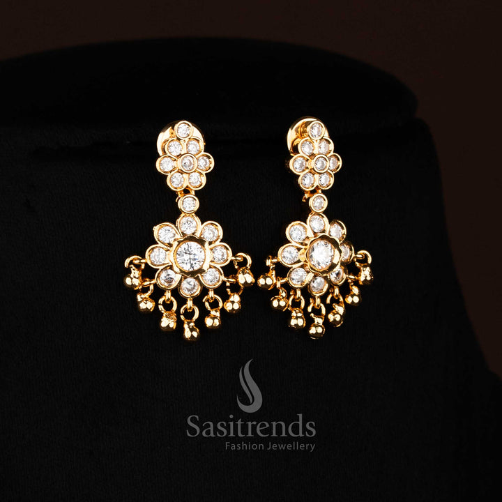 Radiant white American Diamond floral stud earrings with lustrous stones and golden beads ideal for bridal elegance and festive Jewellery - Sasitrends