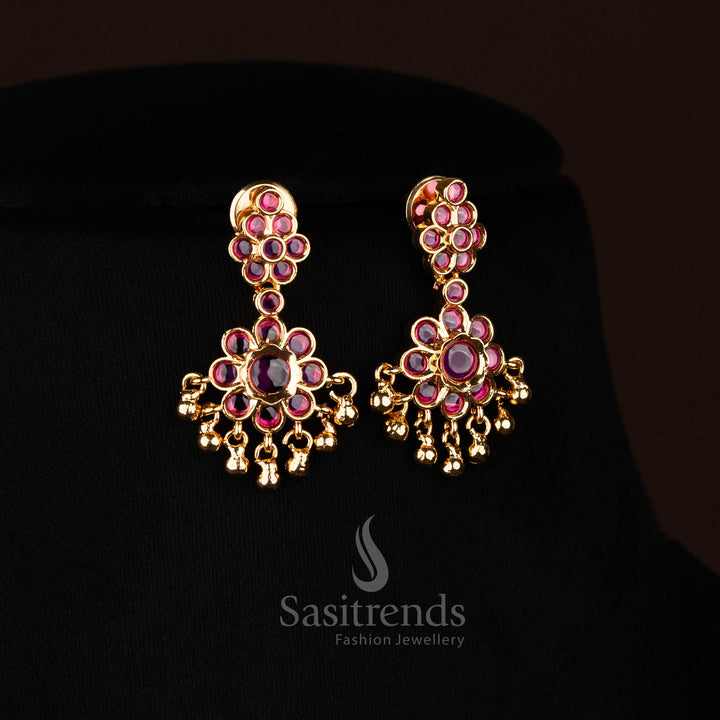 Opulent ruby American Diamond floral chandelier earrings showcasing vibrant stones and golden beads perfect for wedding occasions Jewellery - Sasitrends
