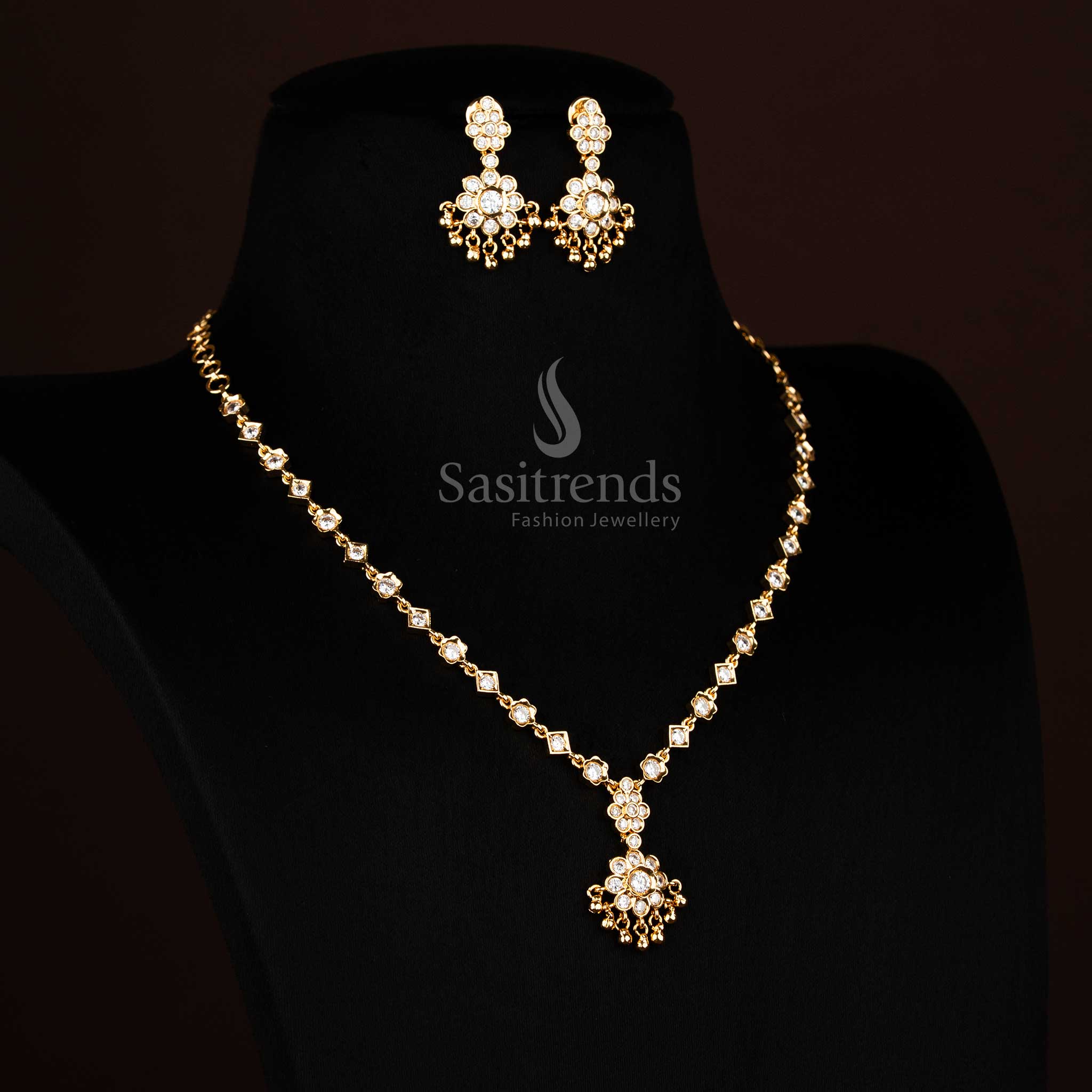 Luminous white American Diamond floral necklace adorned with sparkling stones and golden beads for bridal elegance Jewellery - Sasitrends