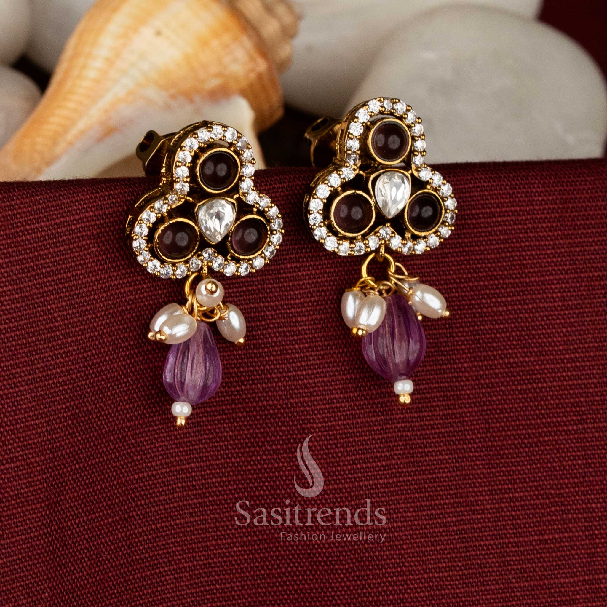 Amethyst charm Victorian style earrings with three-lobed purple AD stones and pearl flow for stylish festive evenings – Sasitrends