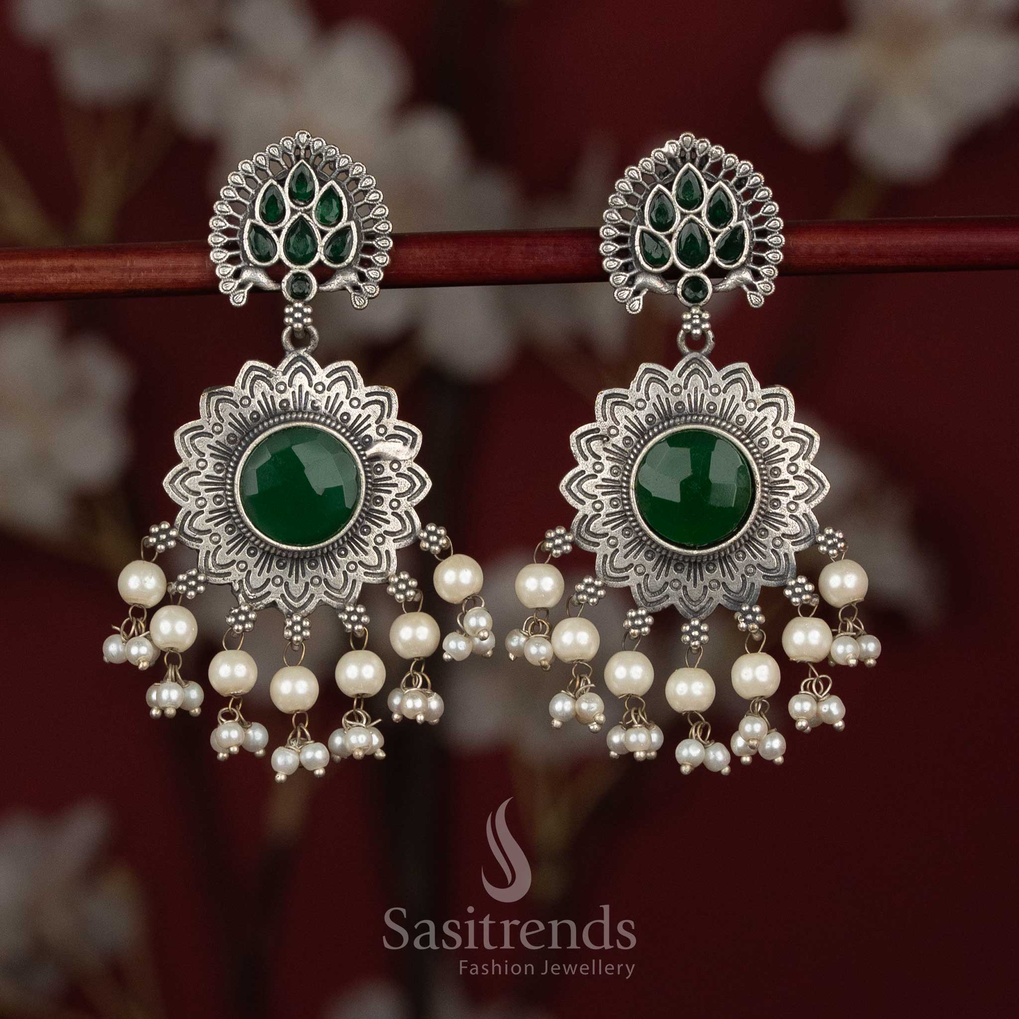  Antique 92.5 oxidised silver peacock feather earrings with teardrop Monalisa stones and sun floral motif - Sasitrends