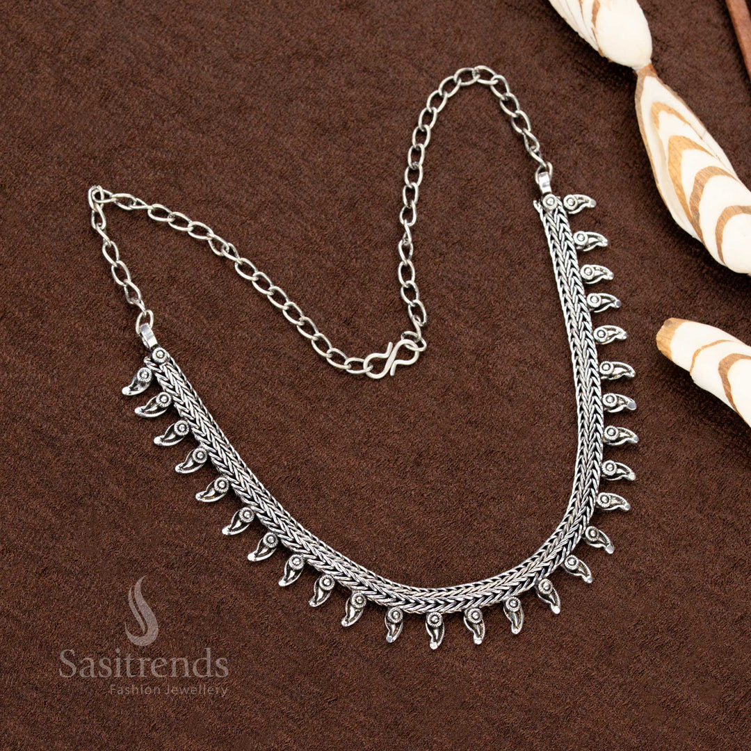 Vintage-finish oxidised German silver tribal necklace with drop-style elements and chain clasp, an exquisite choice for cultural events, ethnic outfits, and statement jewellery lovers - Sasitrends
