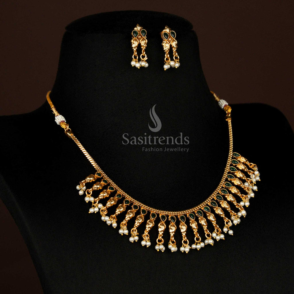 Elegant green floral drop temple jewellery set with matte gold plating and hanging pearls on textured chain – sacred South Indian jewellery for traditional women and cultural gatherings – Sasitrends