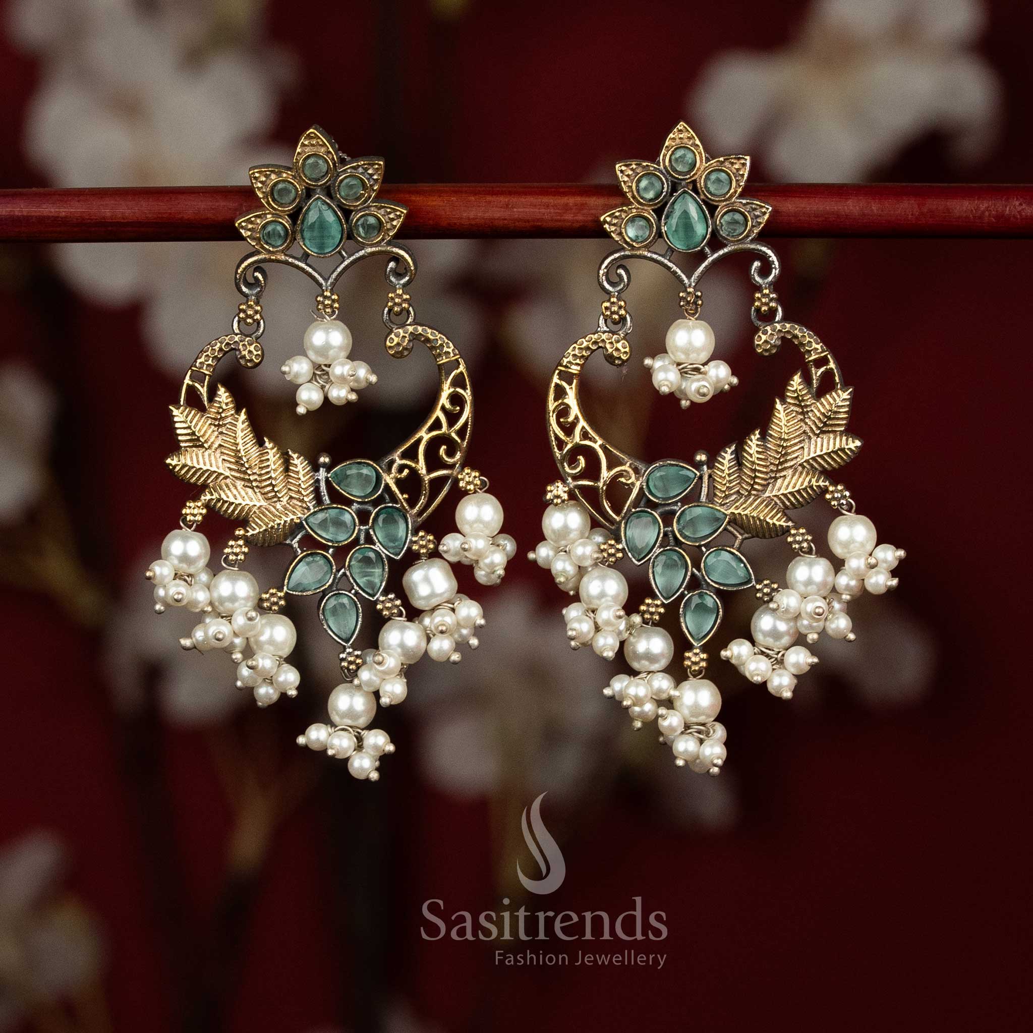 Classic dual tone oxidised silver earrings featuring mint Monalisa stones, circular mandala chandbali layout, peacock arch artistry and pearl drop clusters for calm cultural looks - Sasitrends