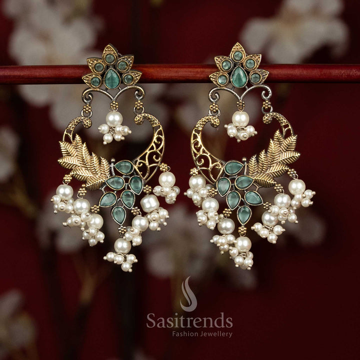 Classic dual tone oxidised silver earrings featuring mint Monalisa stones, circular mandala chandbali layout, peacock arch artistry and pearl drop clusters for calm cultural looks - Sasitrends