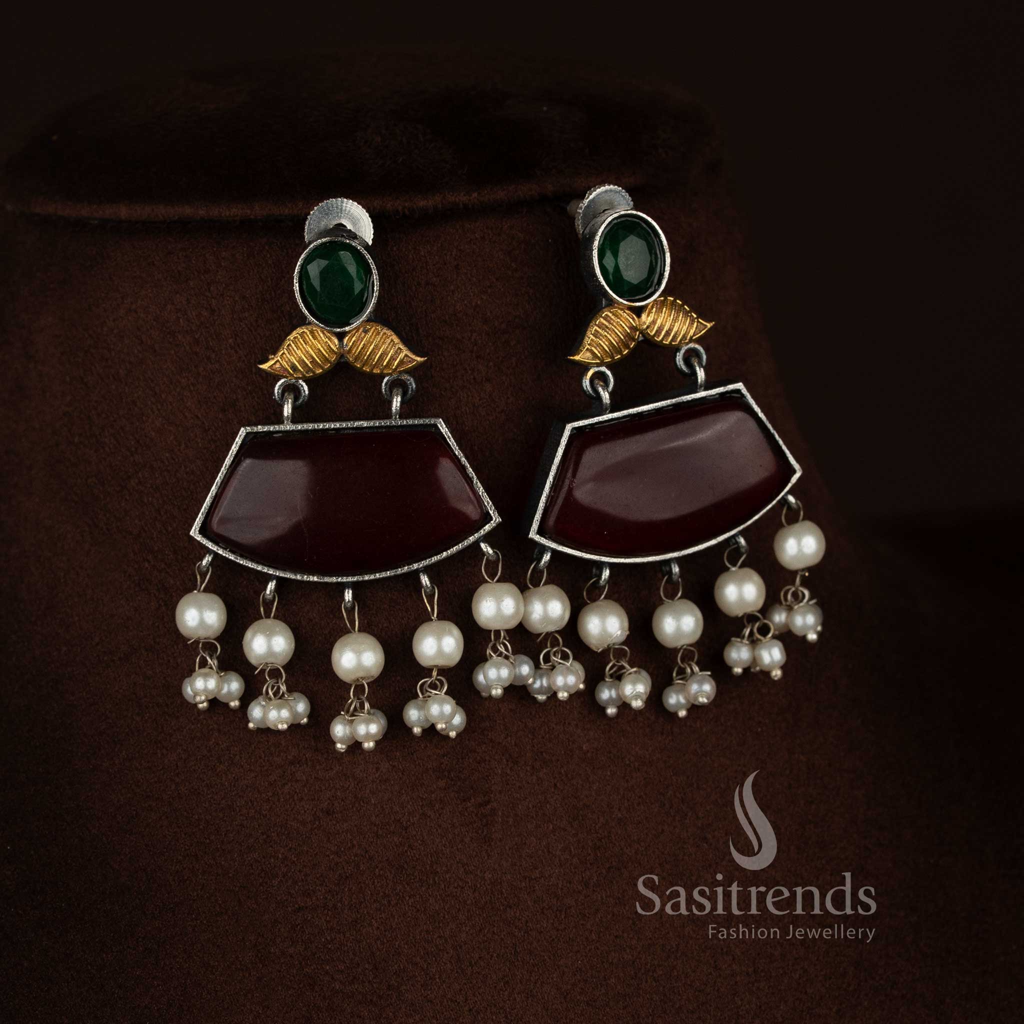 Heritage style oxidised 92.5 silver dual tone red green cow motif leaf earrings with trapezoid stone pearl pendant chain for traditional jewellery - Sasitrends