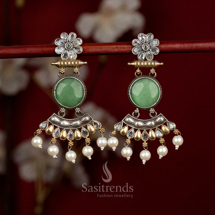 Elegant oxidised silver earrings with light green-white Monalisa stones, sculpted round crescent flower motifs and delicate pearl hangings for graceful party wear - Sasitrends