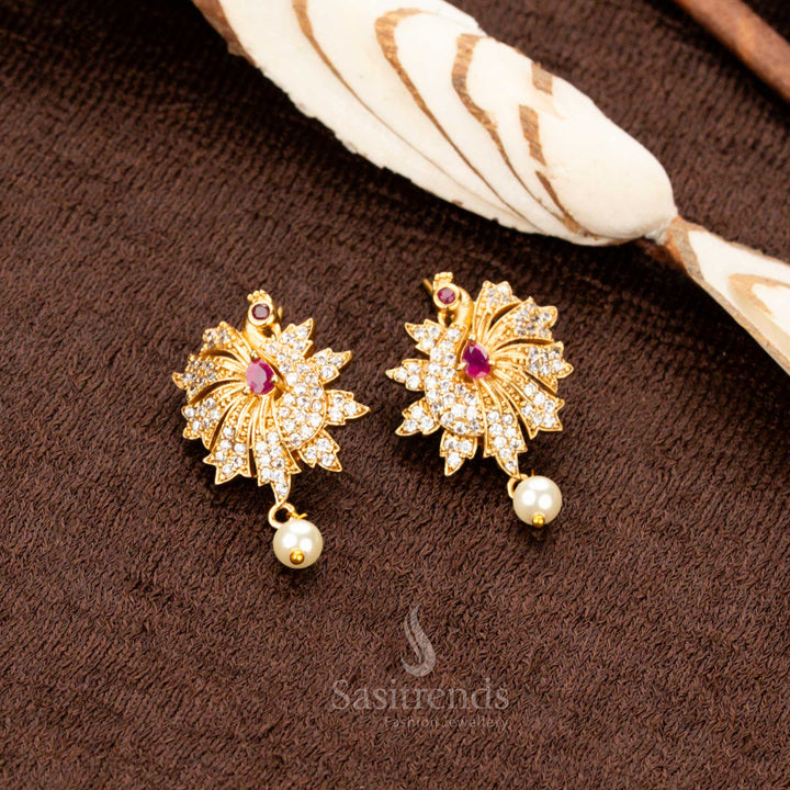 Regal matte gold plated peacock pendant jewellery set embedded with rich ruby stones, designed with elegance and intricate craftsmanship, perfect for bridal wear, Navaratri, and festive grandeur - Sasitrends