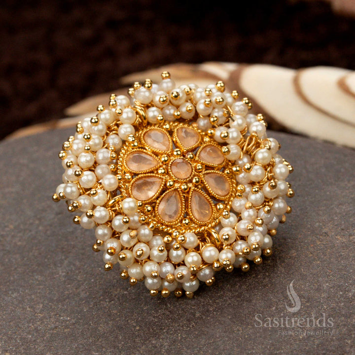Delicate and royal antique gold finish statement ring, beautifully crafted with a soft baby pink floral pearl cluster for a traditional jewellery design - Sasitrends