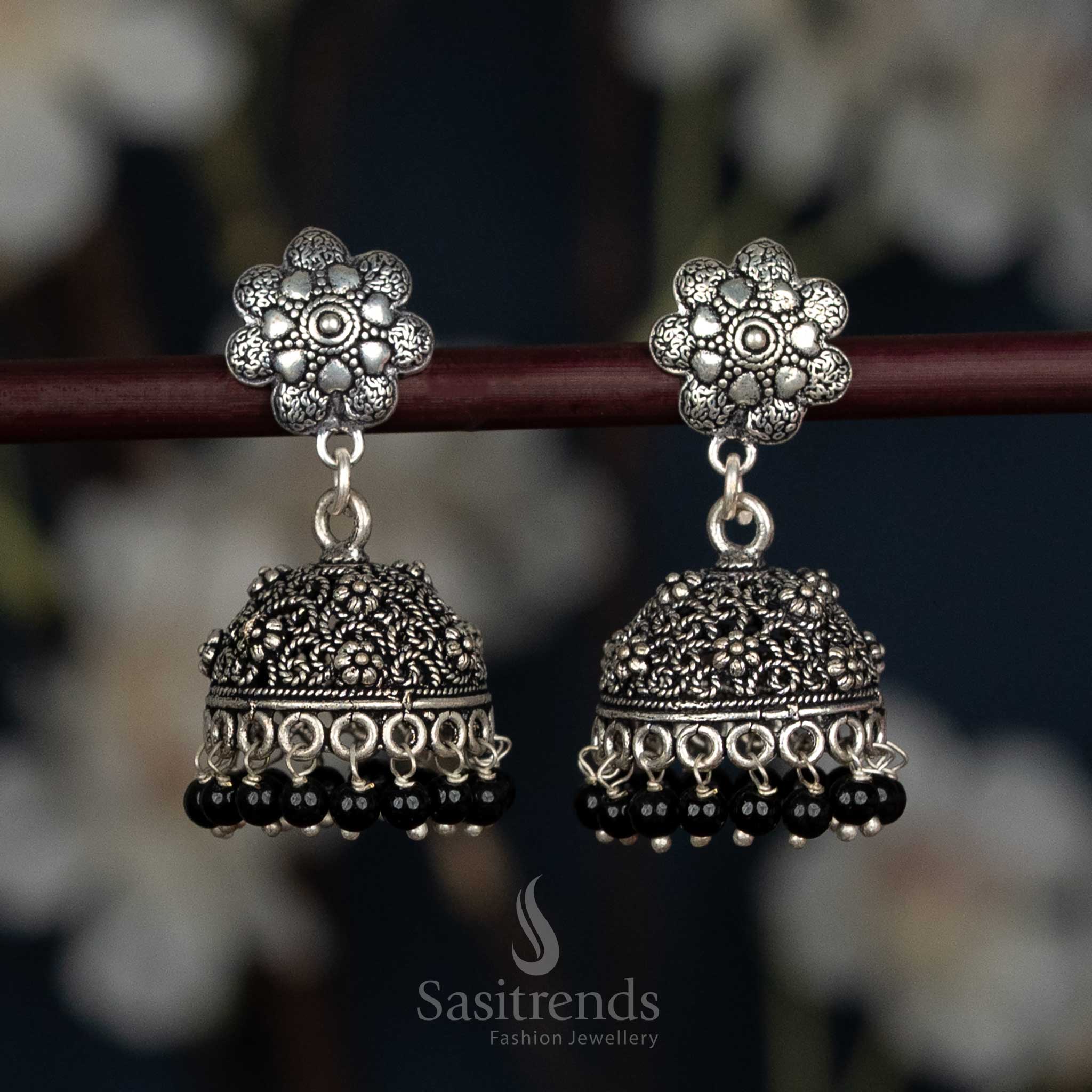 Bold Oxidised Floral Jhumka Earrings With Leaf Motif Studs And Textured Dome In Black Tone, Designed For Women Seeking Stylish Traditional Jewellery – Sasitrends