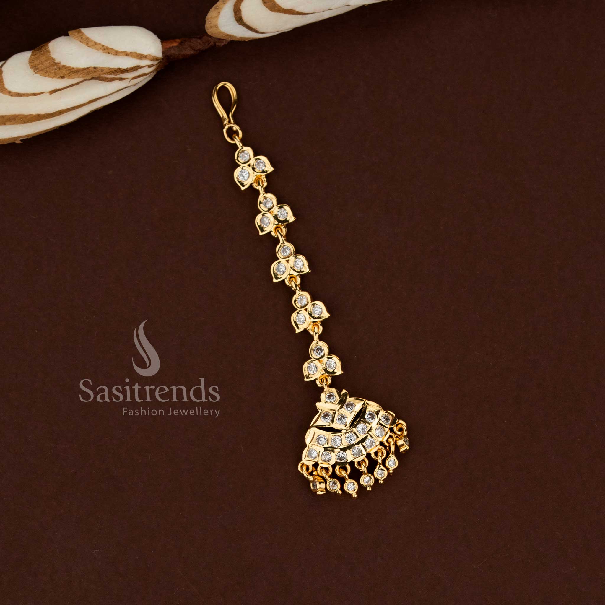 Artistic white tone tribal inspired Impon micro gold plated American diamond maang tikka suitable for bridal styling festive gatherings and ethnic fashion wear - Sasitrends