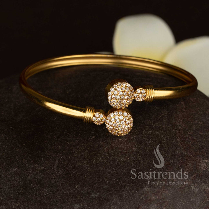 Splendid Matte Gold Plated American Diamond Dual Sphere Openable Bracelet | Party Wear
