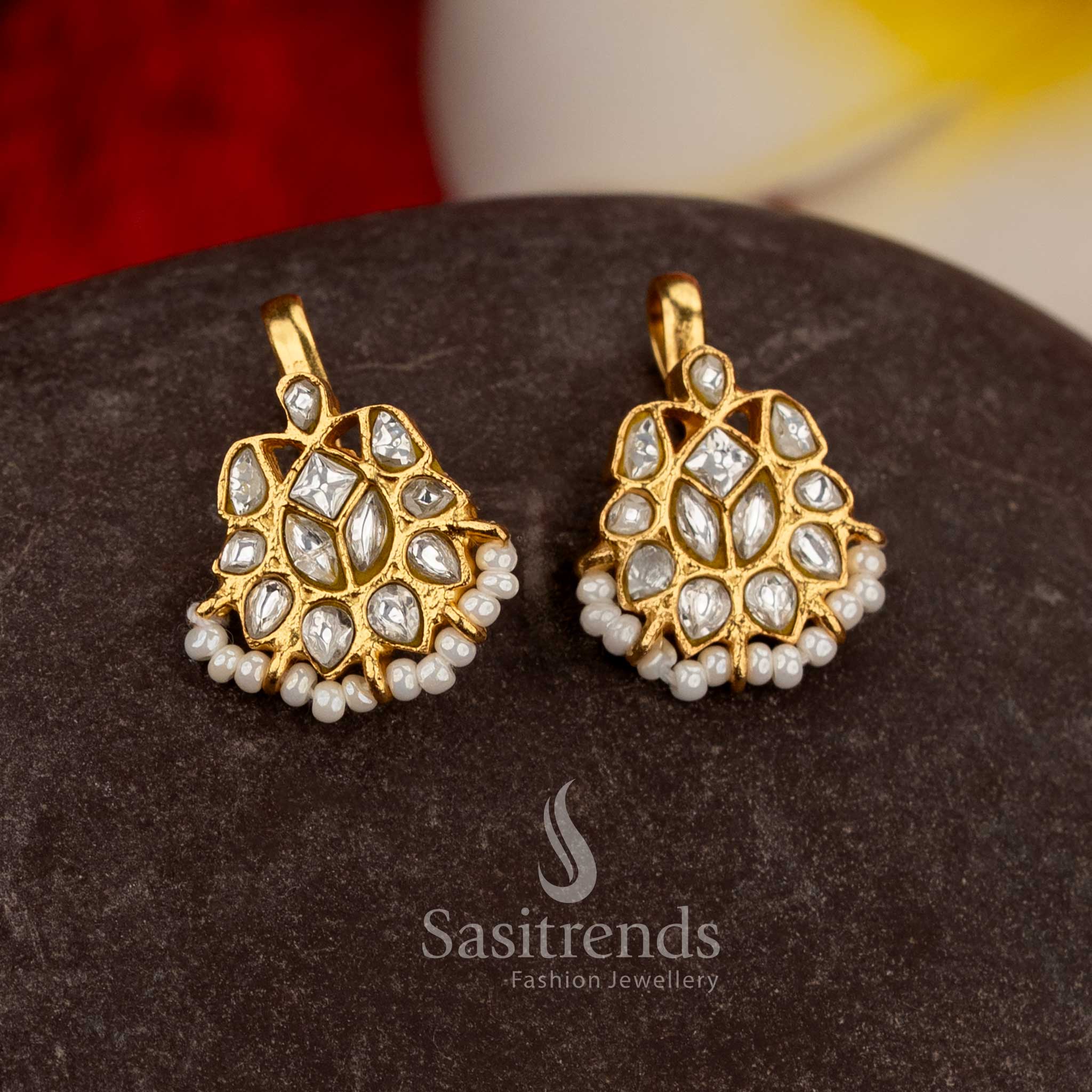 Pure white jadau teardrop leaf crescent bugadi earrings with kundan stones and elegant pearls - Sasitrends