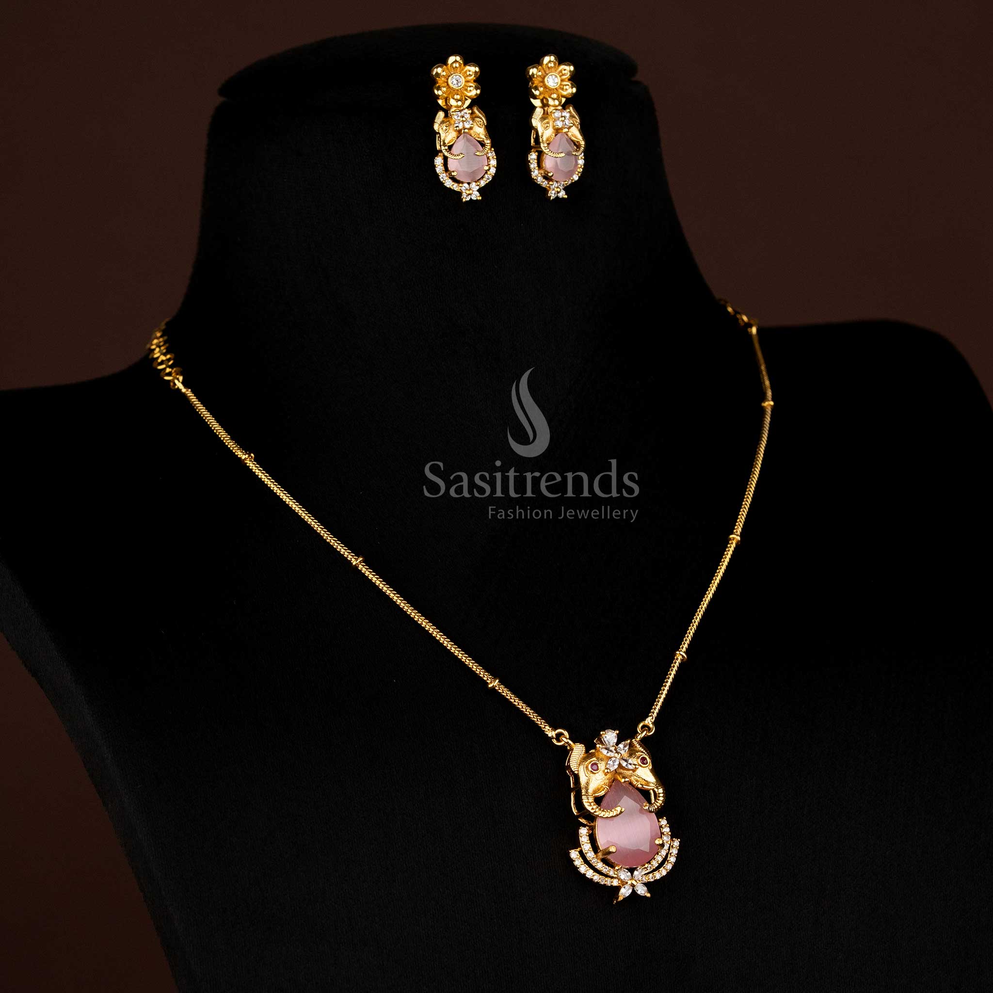 Elegant Temple Matte Gold Elephant Pendant Chain With Earrings Pink Stone Cultural Jewellery Perfect For Bridal Wear By Sasitrends