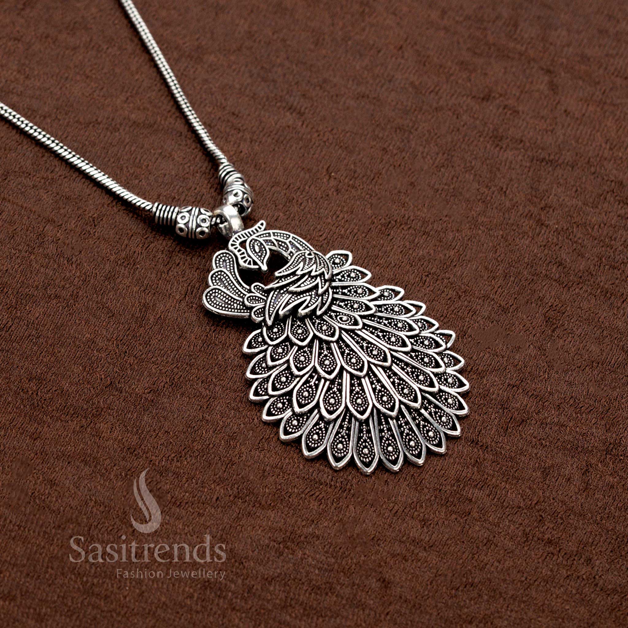 Oxidised silver peacock pendant necklace with layered feathers – Sasitrends