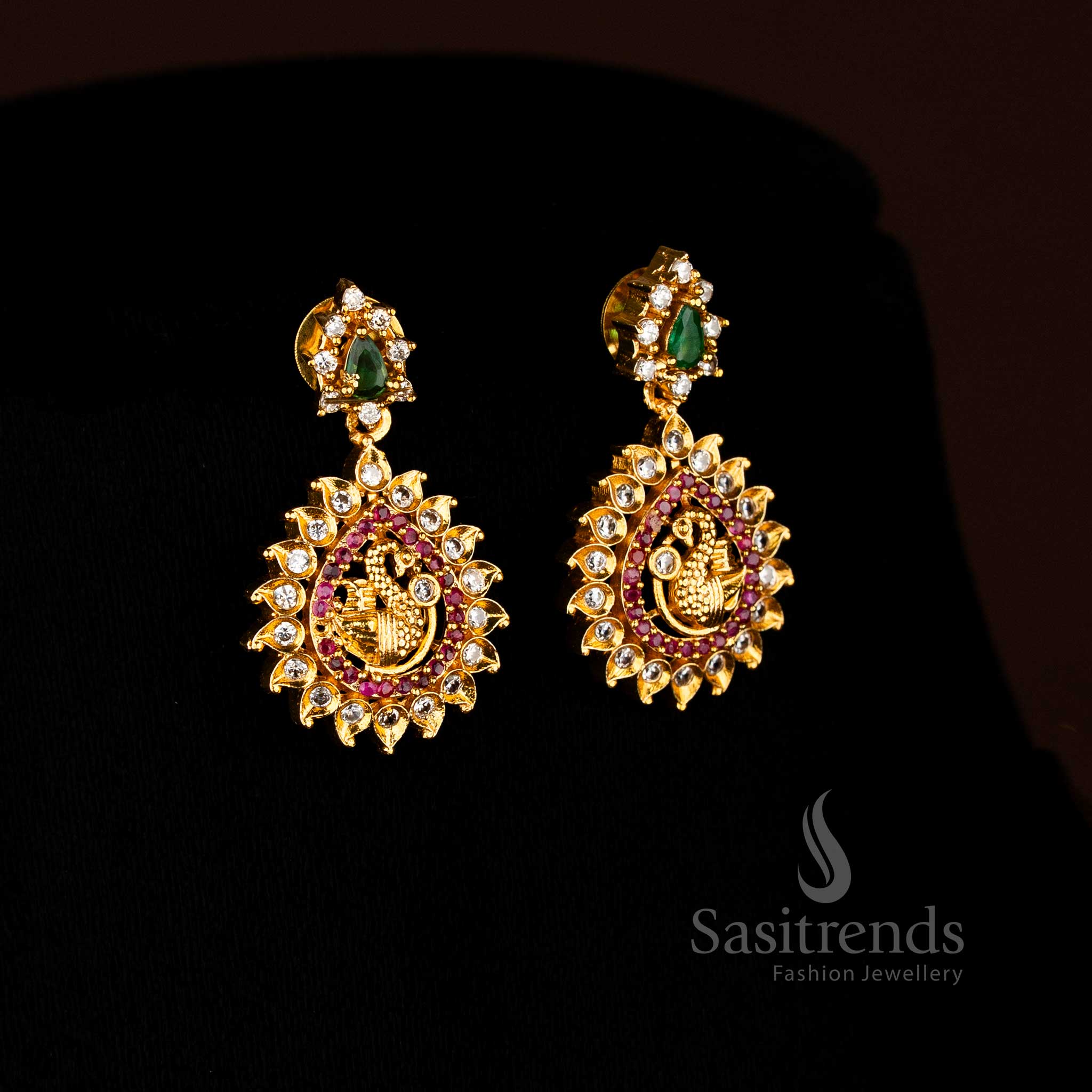 Premium matte gold plated multicolour peacock AD stud earrings adorned with shimmering stones ideal for bridal occasions - Sasitrends