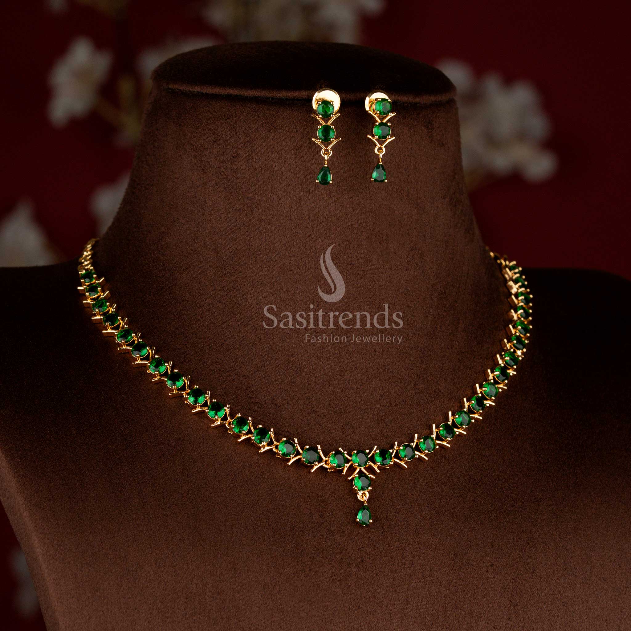 Radiant green micro gold plated American diamond V-cut round stone necklace set styled beautifully for grand festive silk saree occasions – Sasitrends